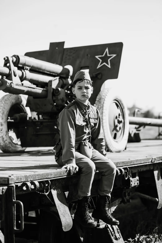 a black and white po of a  sitting on the back of a truck