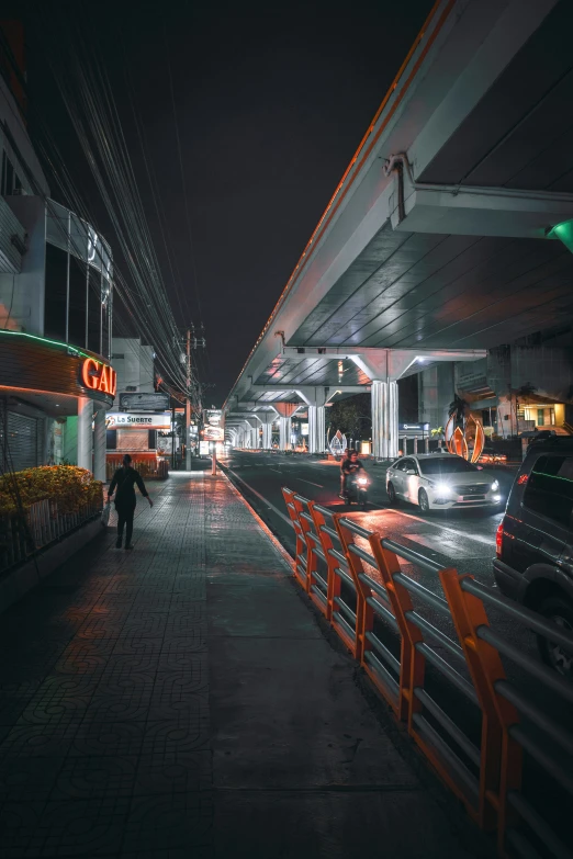 an image of a person standing on the sidewalk