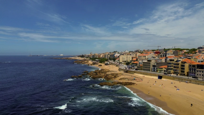 a beach with a bunch of houses sitting on it