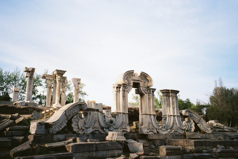 a few large statues sitting on top of cement structures