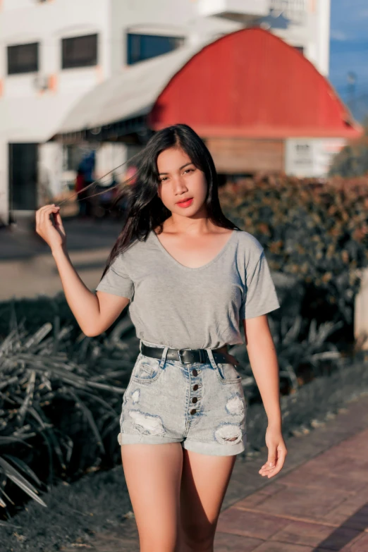 a girl with long hair holding an umbrella