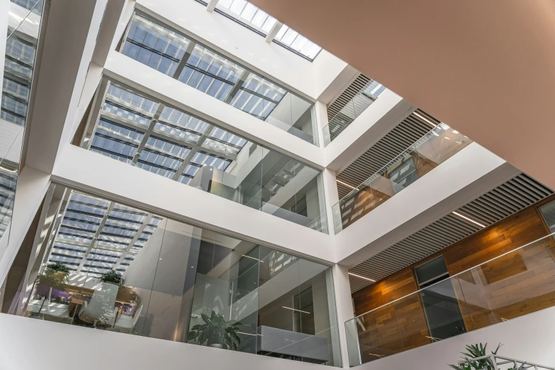 a building with windows reflecting in the glass