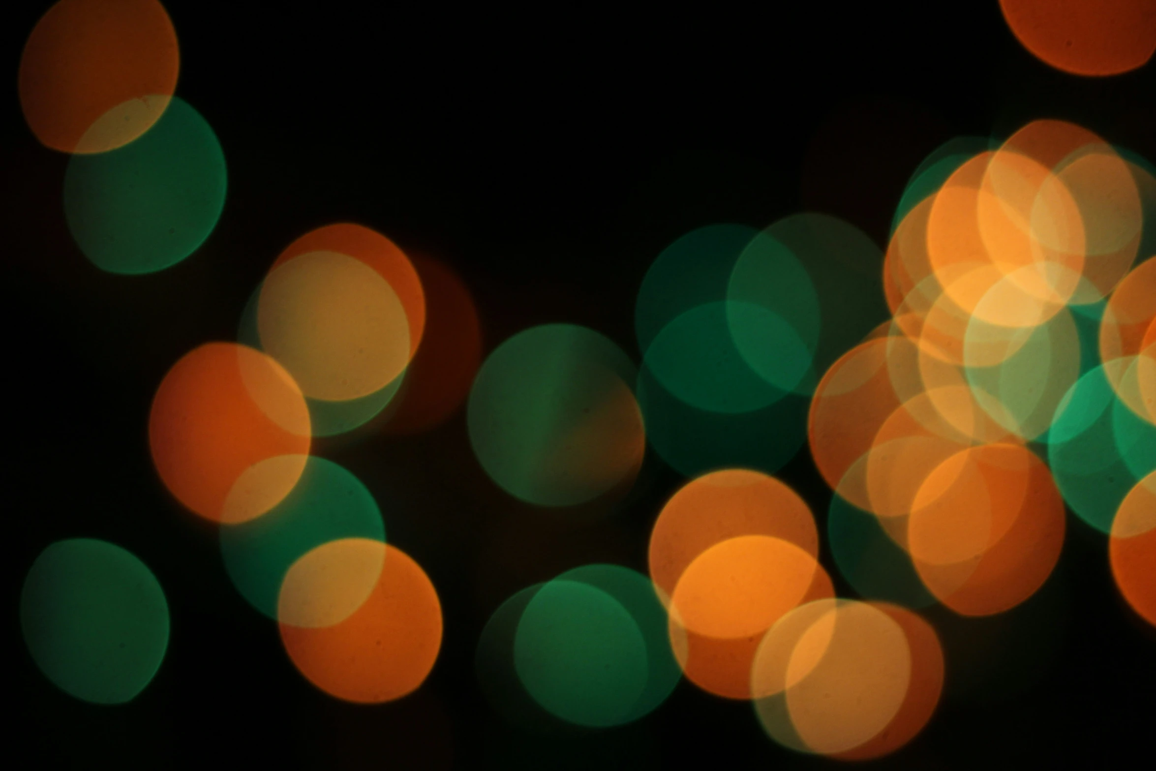 a blurry image of colorful and circular lights