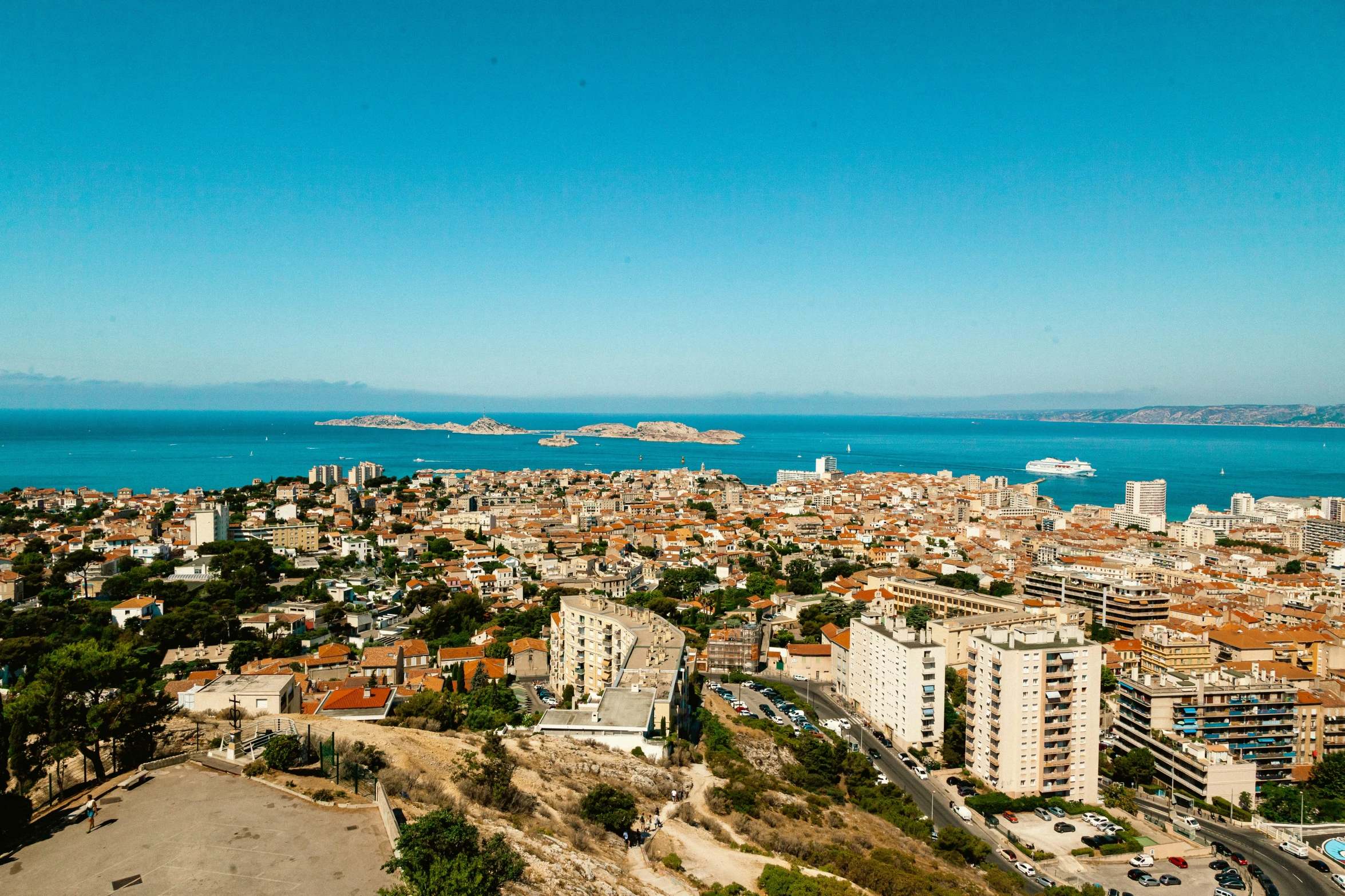 a scenic s of the city from the top of a hill