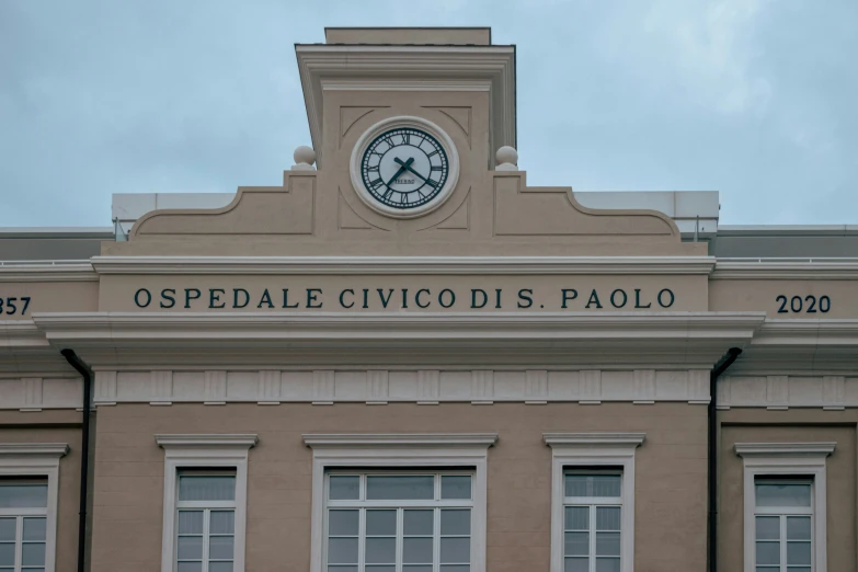 the clock is at the top of the building