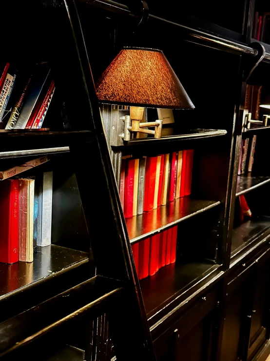 a shelf in a room with a lamp on top of it