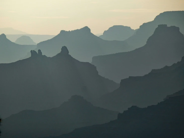 a view of many mountains with no trees
