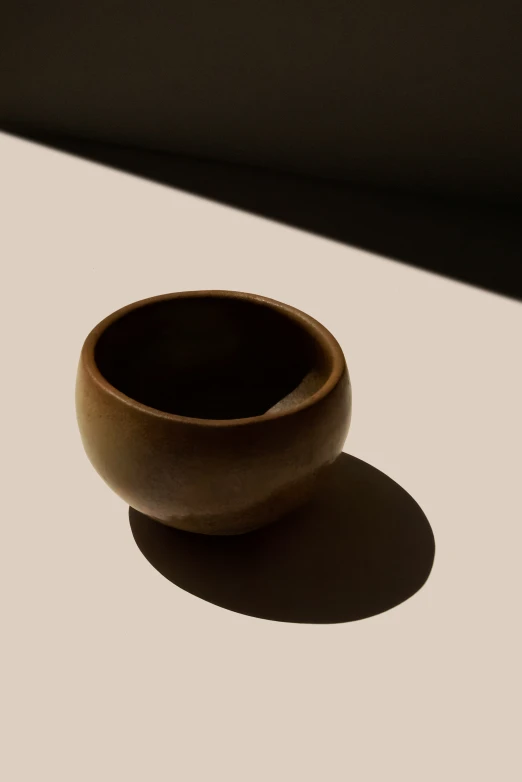 the bowl is placed on the table to be used as an accent for the room