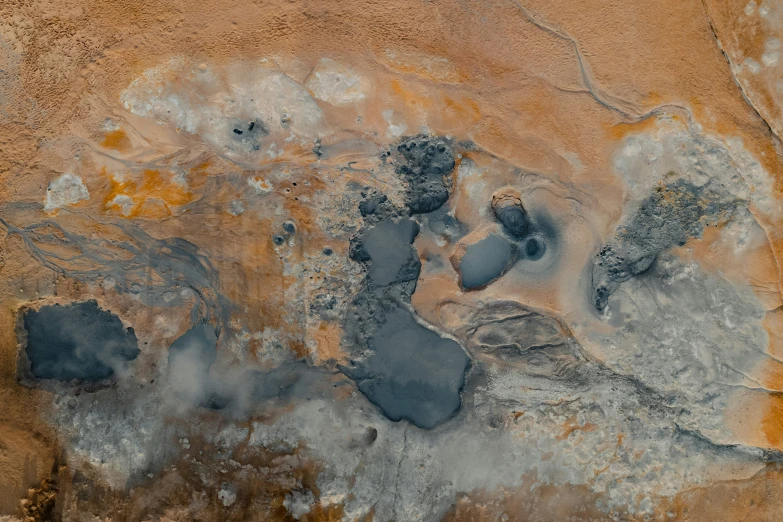 a view of a large crater in a desert