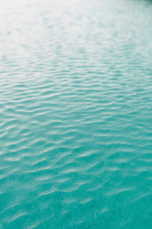 a body of water with ripples in it