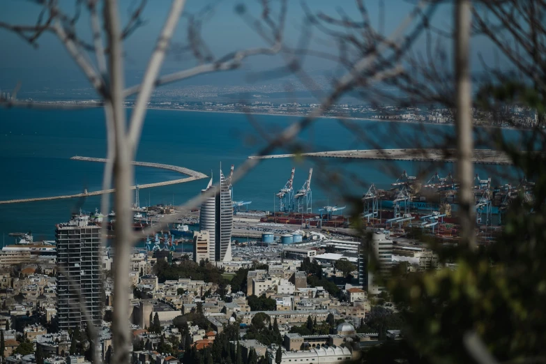 an aerial s of a city with bay in the background