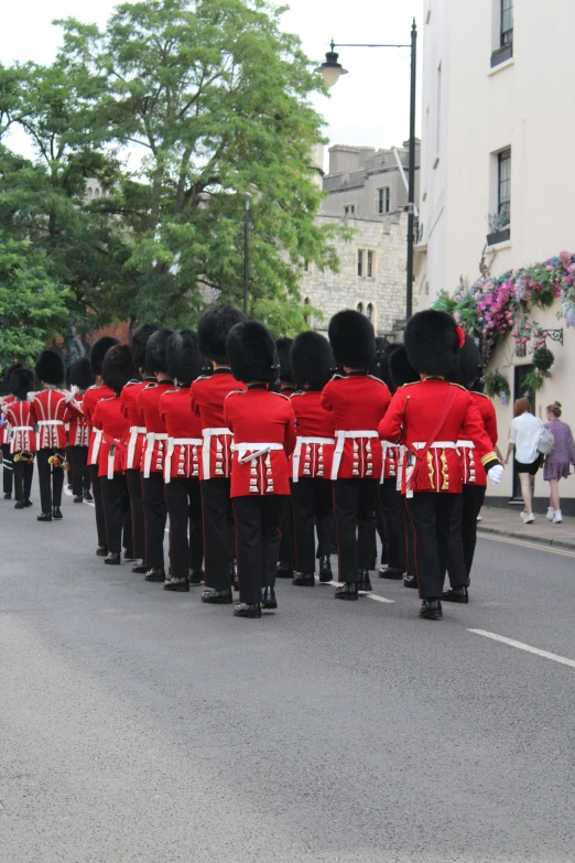 a group of people standing in a parade