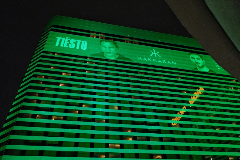 the lit up facade of a large el