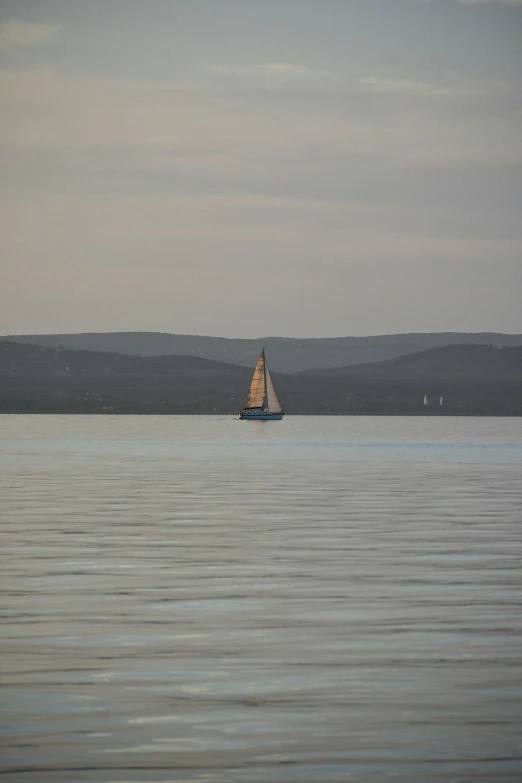 a sailboat that is out on the water