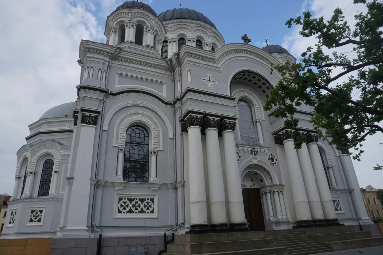 a large building with many arches and columns