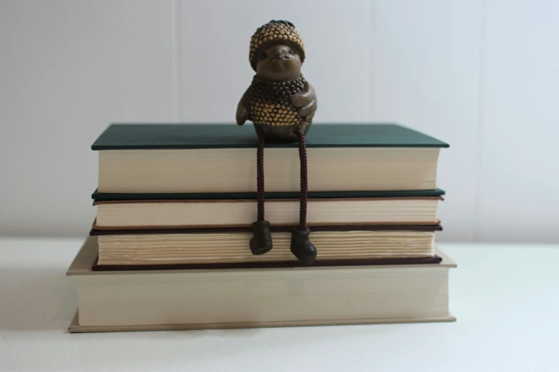 a book on top of a stack of books