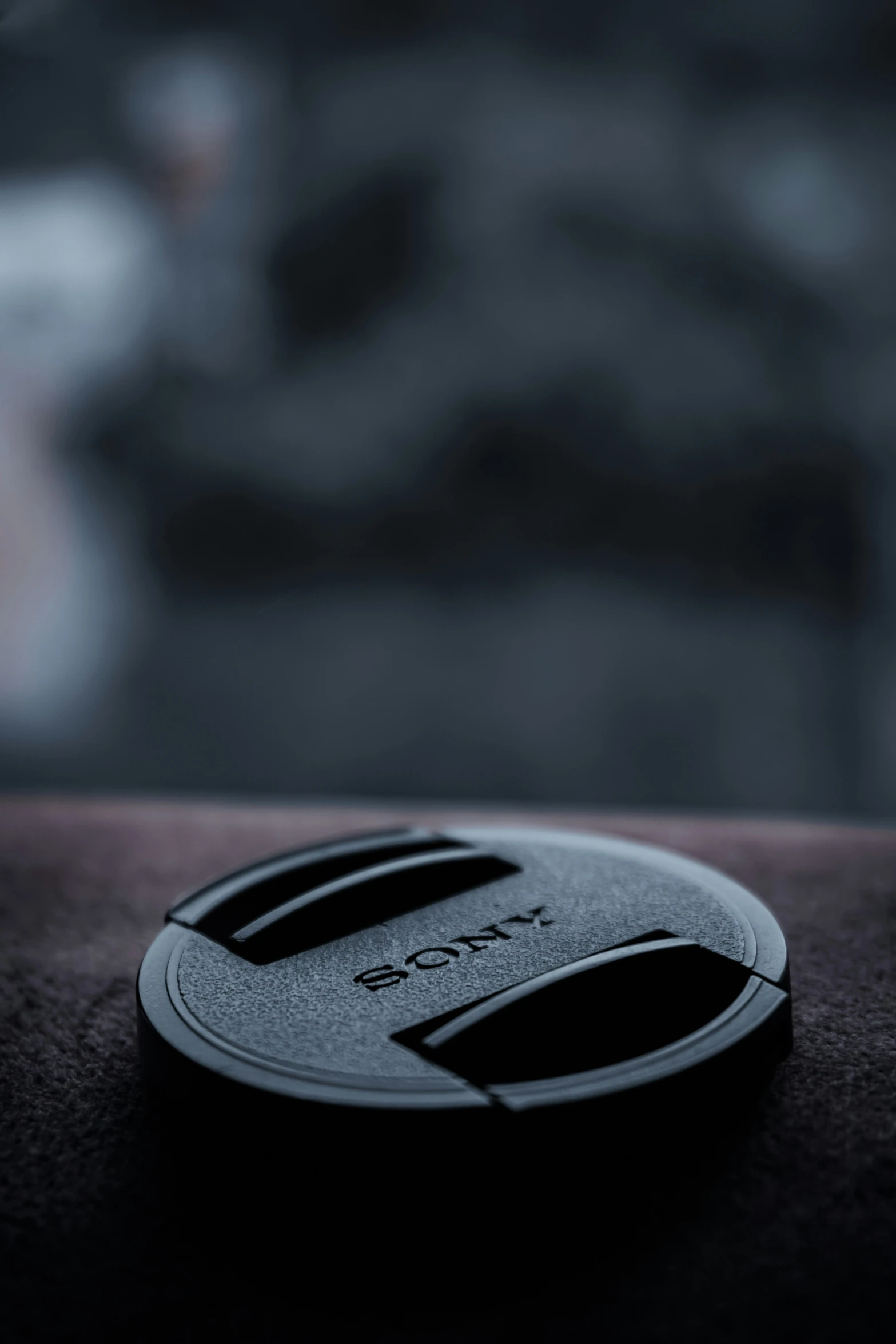 a circular black object sitting on a table