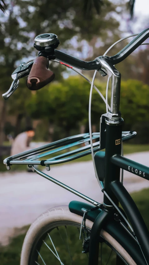 a black bicycle with a white handlebar