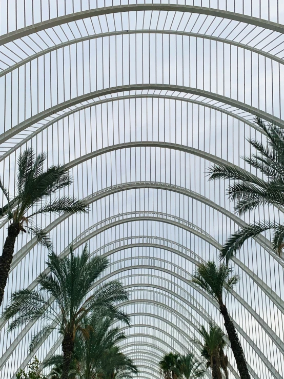 a picture of a building that is covered in a glass