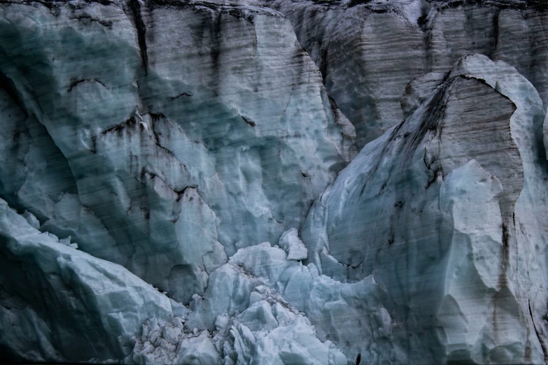 a huge glacier on a mountain with lots of ice