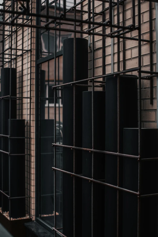 various black speakers are displayed in a room