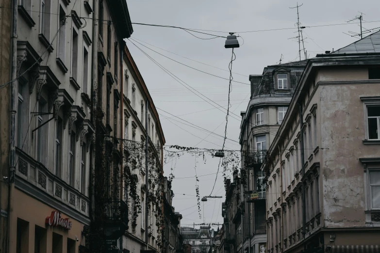 the wires are over the streets and buildings