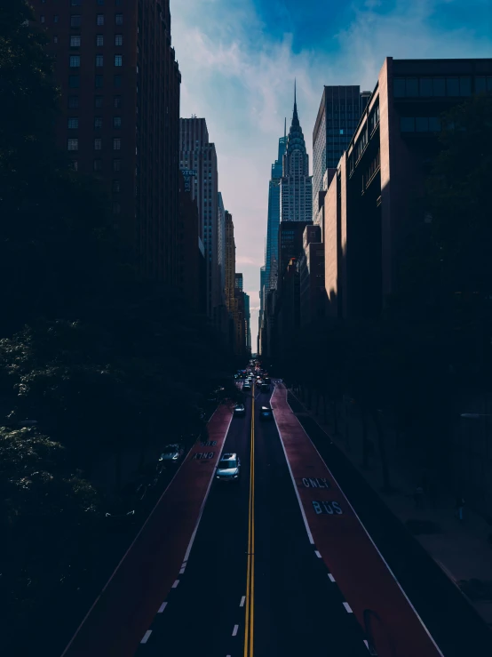 long lines on the side of a street in an intersection