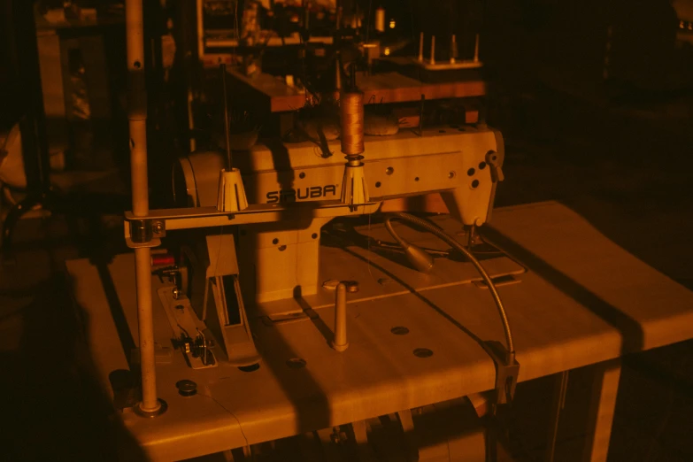 several sewing machines in an open room