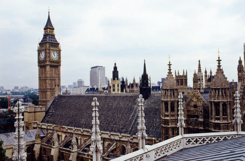 view of the tower of an old gothic church and clock tower