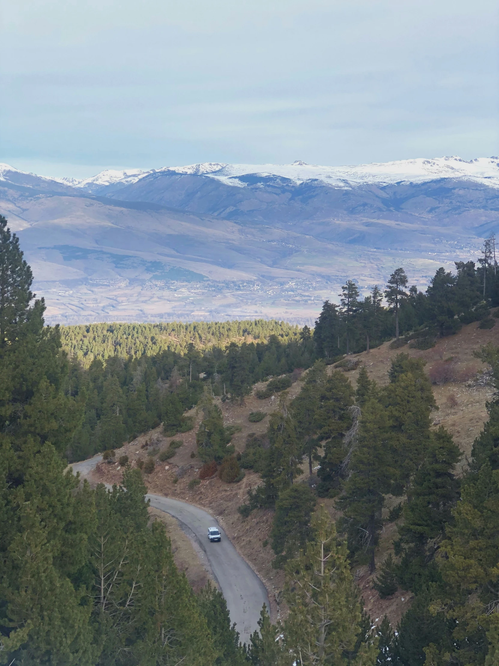 the mountains in the distance are covered with snow