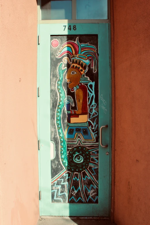 a close up of a door with an image on it