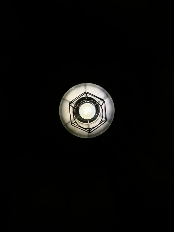 a white light is shown in the dark