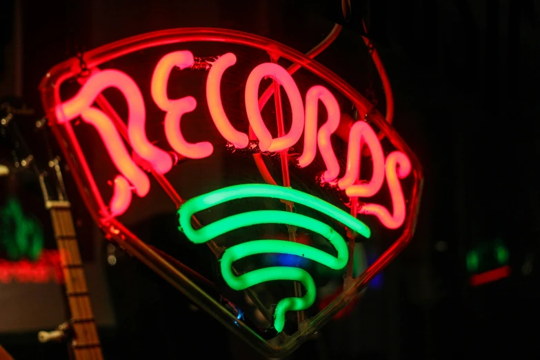 neon signs that are part of the record store