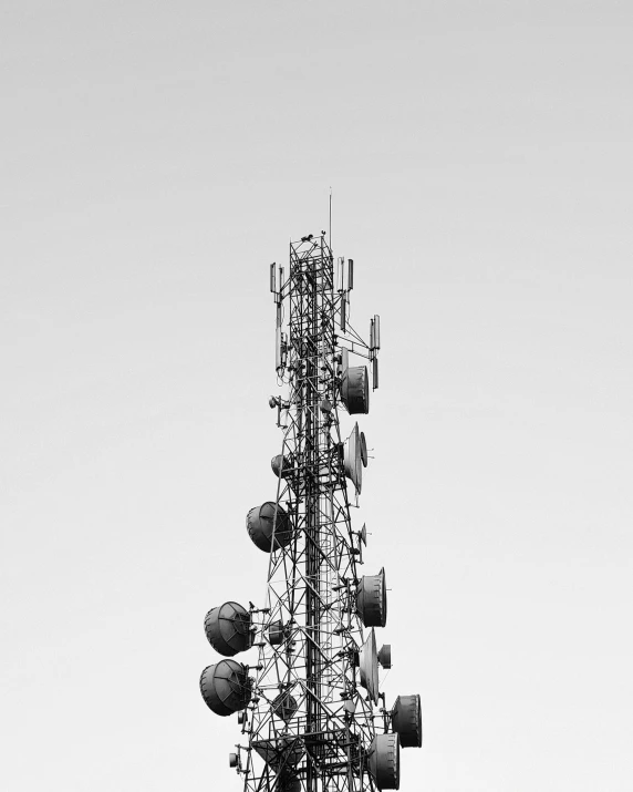 a tower with multiple cellphones on top