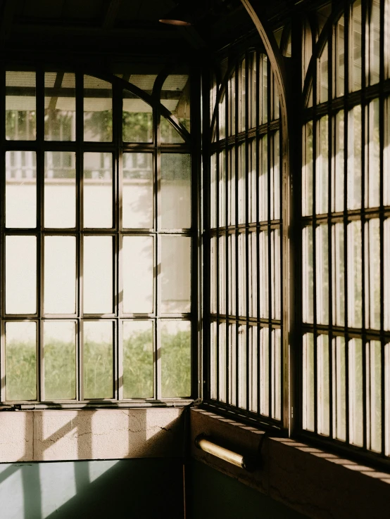 a room that has an arched glass window