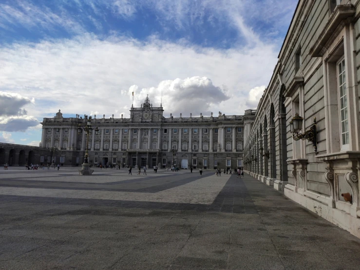 the view of a palace is seen through a narrow window