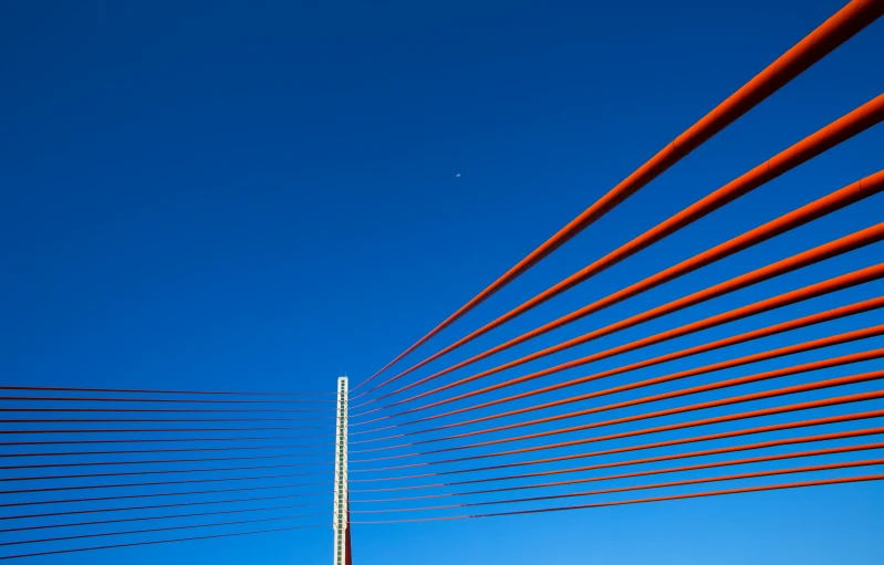 an image of a very large structure with lots of red rods