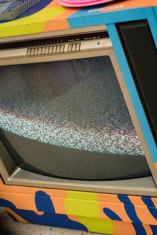 a close up of a television that has been turned on