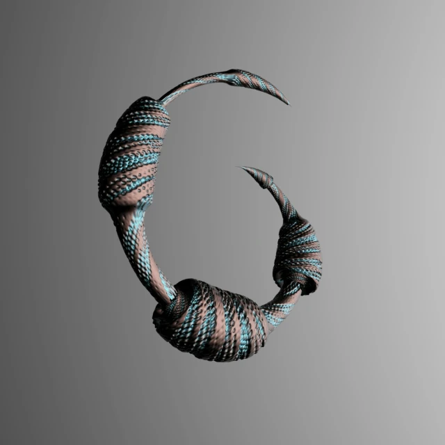 a circular object with twisted fabric, in the shape of a crescent