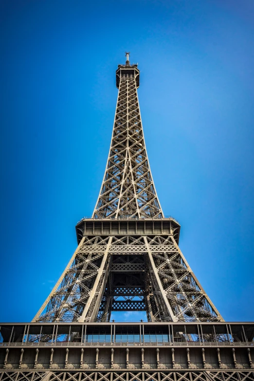 the view looking up at the eiffel tower