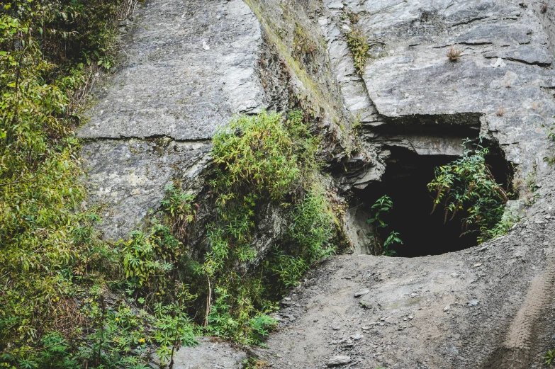 an open entrance is shown in the rock