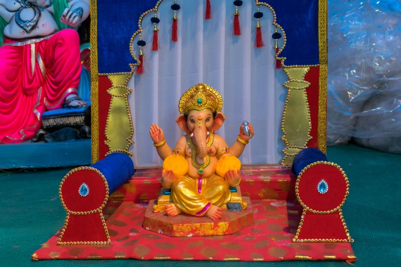 an ganji decoration on a stand in a store