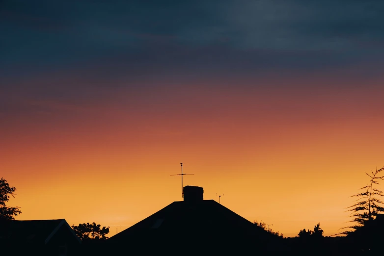 a sunset view from the roof of a building