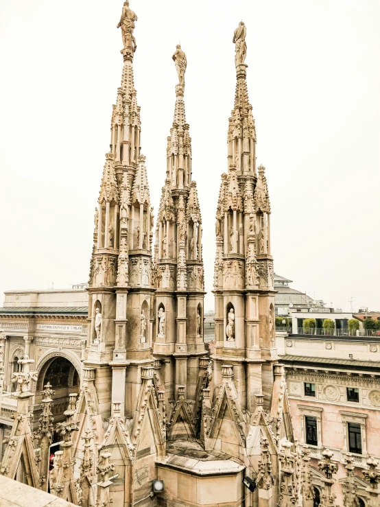 the top towers and spires of an ancient building