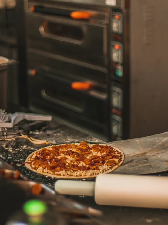 a pizza sitting on top of a table