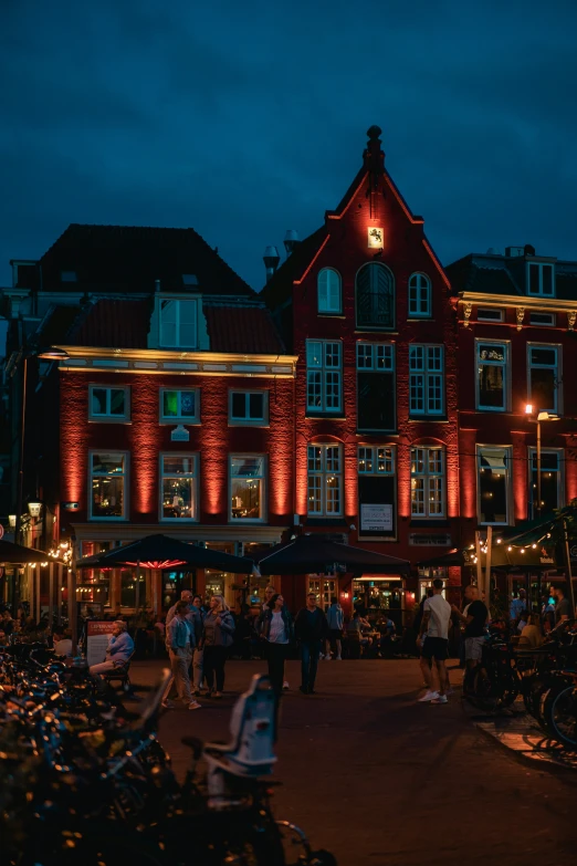 a red building that is lit up for the holidays