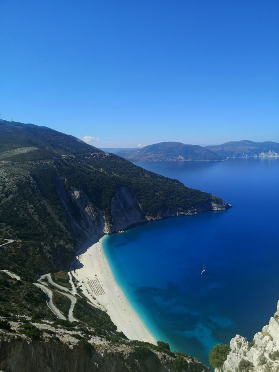 a view of a bay from the top of a hill