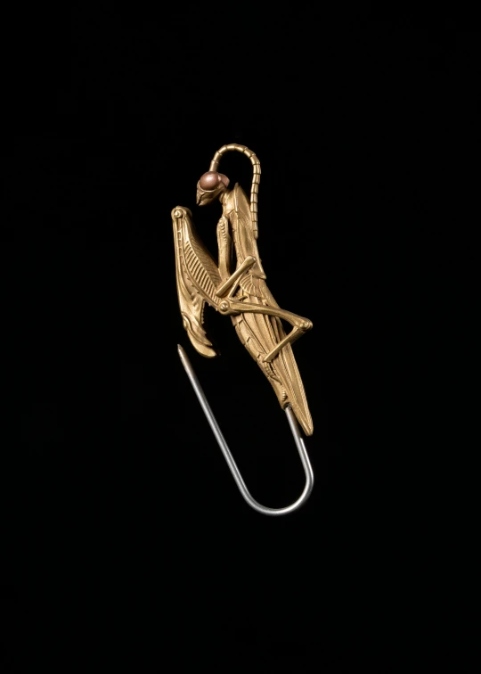 an ornament hanging from a tie piece