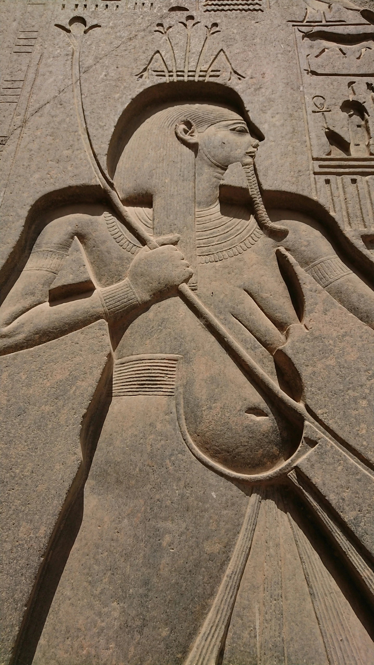 an ancient egyptian carving on sand near the egyptian calendar