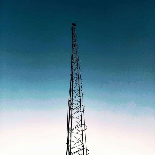 a po taken from a distance, with the top half of an antenna tower in the distance